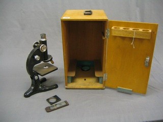 A students single pillar microscope by Beck Ltd London model 29, complete with carrying case
