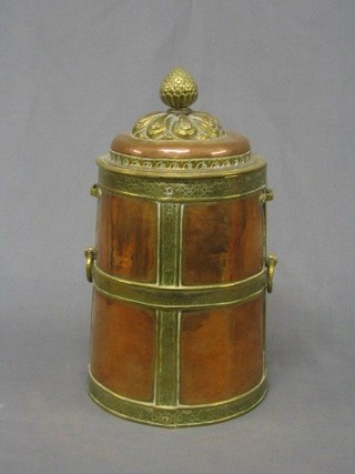 A 20th Century cylindrical Tibetan copper and brass jar and cover 11"