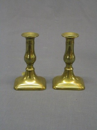 A pair of 19th Century brass candlesticks with ejectors 6"