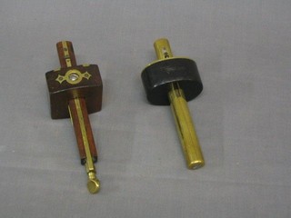 An ebony and brass mortice gauge and 1 other