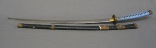 A reproduction Katana with plain blade, contained in a scabbard decorated mythical beasts 44"