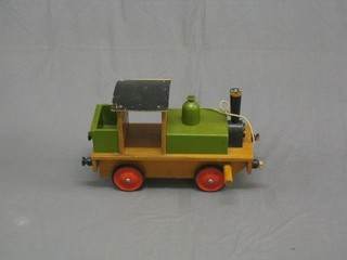 A childs wooden pull along tank engine 20"