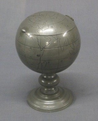 A  19th/20th Century engraved Oriental pewter trinket box in the form of a globe, the interior section fitted a cylindrical jar and cover, raised on a spreading foot