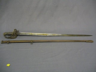 A Victorian Infantry Officer's sword with blade etched Royal Cypher with pierced brass hilt (f) and complete with a brass scabbard