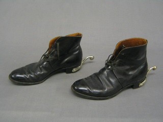 A pair of Chelsea boots by Moss Bros with cadbury spurs (approx size 7)