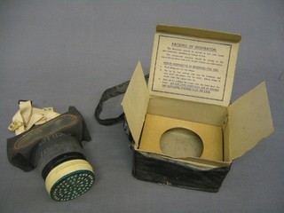 A WWII Civilian gas mask and carrying case
