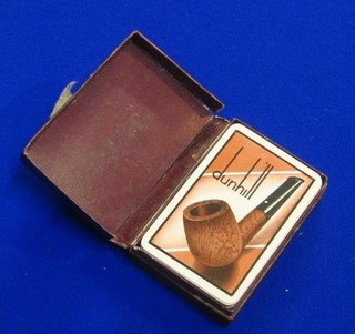 A pack of Dunhill playing cards, cased (case damaged)