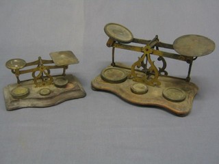 2 pairs of brass and wooden letter scales