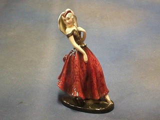 A 1930's Goldscheider pottery figure of a walking lady with parasol (chip to the inside hem of skirt) base marked Goldscheider Wien Made in Germany Hercxeg and impressed 8138 9"