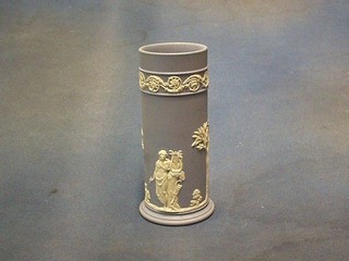 A cylindrical Wedgwood blue Jasperware vase, the base marked Wedgwood 68 and impressed 68, 6"