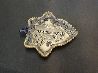 A 19th Century blue and white pottery leaf shaped nut dish 6" (cracked)