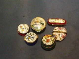 A circular reproduction porcelain pill box the lid decorated ducks 3", 3 others, a Limoges rectangular porcelain trinket box 3" and an Oriental heart shaped box (6)