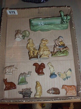 A rectangular Wade vase in the form of a tree stump with squirrel 5", a Wade figure of a deep sea diver and shepardess, a Wade figure of a girl with pig, Wade figure of butterfly (chipped), do. figure of a seal and 12 other Wade figures