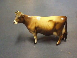 A Beswick figure of Jersey Cow Newtown Tinkle (legs f and r, horn damaged)