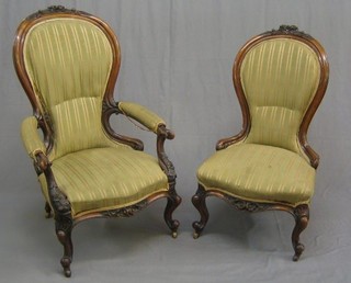 A Victorian carved walnut open arm chair raised on French cabriole supports upholstered in Regency stripe material together with a matching spoon back chair