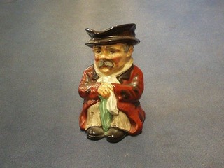 A Wedgwood unicorn pottery Toby jug in the form of a seated Elderly gentleman 5"