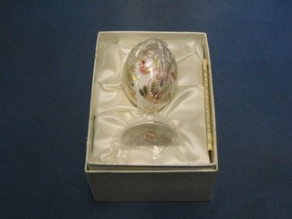 A limited edition Royal Crown Derby Egg of the World, boxed