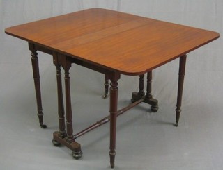 A Victorian mahogany Sutherland table with double gateleg action to the base 36"
