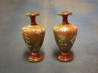 A 20th Century Dresden twin handled urn and cover (finial f) with floral decoration and goats mask handles 6"