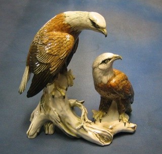 A Continental porcelain figure of 2 seated eagles, the base impressed 7726 13"