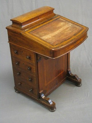 A Victorian walnut Davenport with stationery box to the back, the pedestal fitted 4 long drawers 21"