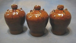 3 Oriental brown glazed 3 handled flasks of oval form 9"