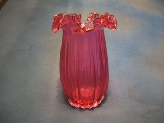 A Victorian style red glass vase 11"