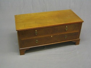An Edwardian inlaid mahogany chest of 2 short and 2 long drawers with satinwood inlay, raised on bracket feet 42"
