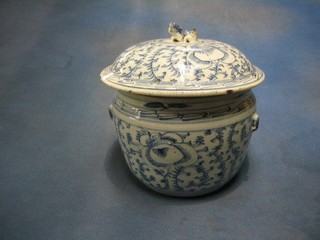 A 19th/20th Century Oriental blue and white jar and cover 11"