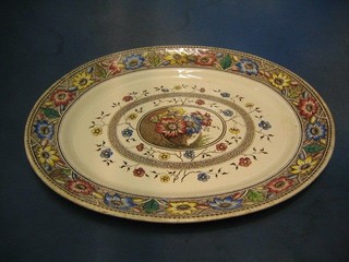 A Victorian oval pottery floral pattern meat plate 21"