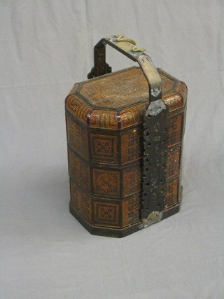 An Eastern wicker and brass banded metal storage box