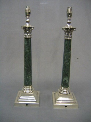 A handsome pair of modern silver plated table lamps raised on stepped silver plated bases with green marble columns and Corinthian capitals 19"