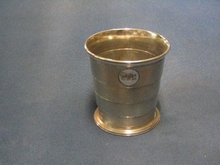 A 19th Century silver plated folding cup with engine turned decoration