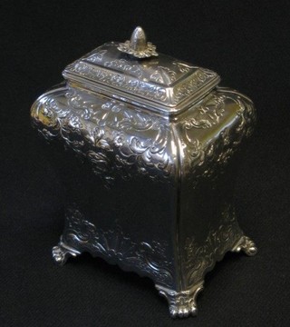 A George II embossed silver caddy of rectangular waisted form, engraved and embossed throughout, raised on 4 scroll bracket feet, London 1757, makers mark IPG, 6 ozs