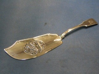 A George III silver fiddle pattern fish slice with armorial decoration the blade decorated a plough and bull, London 1818, 4 ozs
