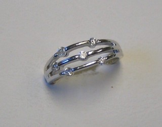 A lady's modern 18ct 3 band white gold dress ring set 6 diamonds