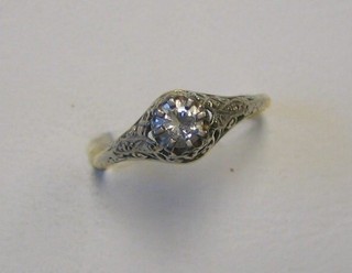 A lady's solitaire diamond engagement ring set on an 18ct gold mount