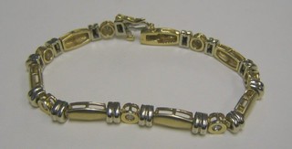 A lady's 14ct 2 colour gold bracelet set 7 diamonds