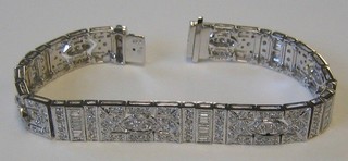 A lady's Art Deco style 18ct white gold bracelet set numerous diamonds