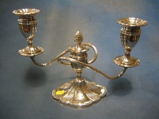 A silver plated twin light candelabrum