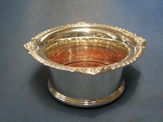 A modern silver Georgian style bottle coaster with gadrooned border Sheffield, 7 1/2"