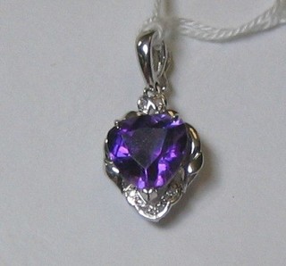 A lady's heart shaped amethyst pendant