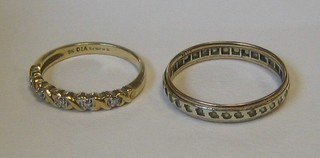 A lady's 9ct gold half eternity ring and a full eternity ring