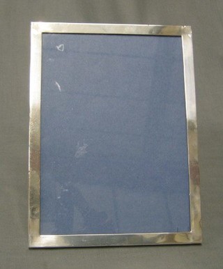 A plain silver easel photograph frame Birmingham 1954 8 1/2" x 6 1/2"