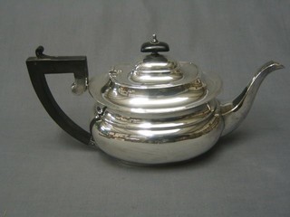 A Georgian style oval silver plated teapot