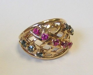 A pierced 9ct gold ring set red, blue and green hardstones