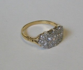 A lady's 18ct yellow gold triple cluster dress ring set numerous diamonds (approx 1ct)