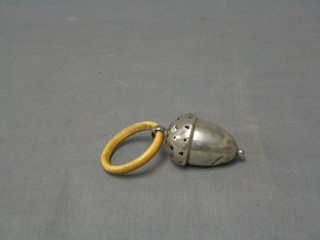 An Edwardian silver rattle in the form of an acorn with circular ivory teething ring Birmingham 1909