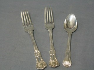 A George III silver Princes pattern table spoon London 1810 and a pair of Victorian silver Queens pattern table forks, London 1840