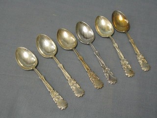 A set of 6 silver teaspoons with golf motifs Birmingham 1934  5 ozs